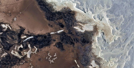 glioblastoma, black gold, polluted desert sand, abstract photo of the deserts of Africa from the...