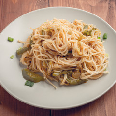 Asian noodles on plate .