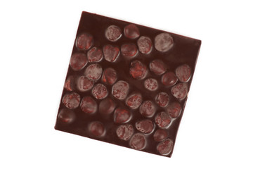 Dark chocolate bar with nuts isolated on a white background.