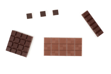 Set with different kinds of chocolate on white background.