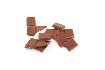 pieces of milk chocolate bar isolated on white background.