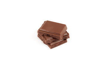 pieces of milk chocolate bar isolated on white background.