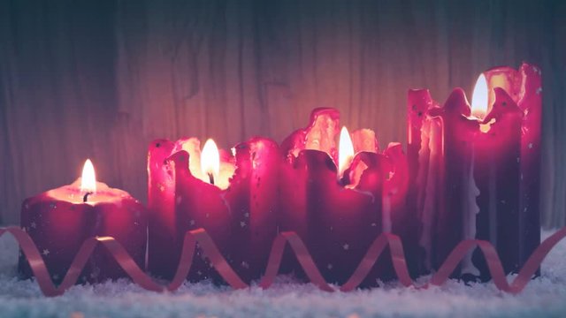 Four burning Advent candles and decoration. . Christmas background.