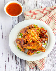 Crispy Baked Chicken Wings with Sweet Chili Sauce Over the Top View
