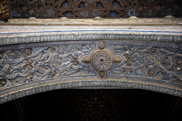 Architecture of the famous Alhambra Palace in Granada, Andulasia, Spain. The palace is a famous Islamic historical palace with spectacular architectural beauty.