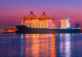 Shipping port. Logistics and transportation of international import export container cargo ship...