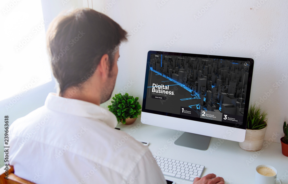 Poster man browsing digital business website on computer