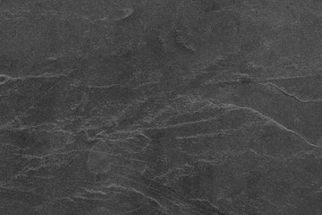 Dark grey black slate background or texture.