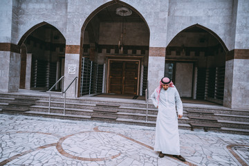 Arab businessman using mobile phone