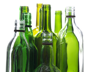 Empty glass wine bottles on a white background