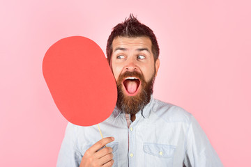 Cheerful bearded man hold paper nameplate. Feeling&emotions. Face expression. Fashion, beauty, hairdressing, barber salon. Laughing man with beard&mustache. Blank paper. Happy man with empty name card