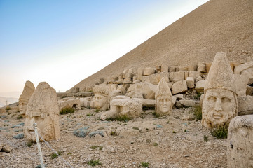 Statues around the tomb of Commagene King Antochus I on the top of Mount Nemrut, near Adıyaman,...