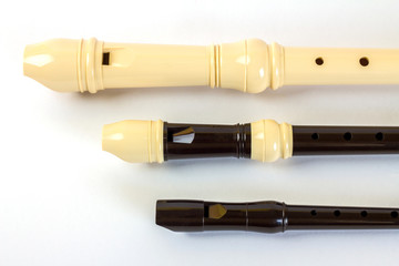 Plastic recorder flute set. Sopranino, soprano and alto flutes © angelozano 