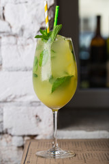 Fresh fruit coctail on the table of restaurant cafe transparent with puffs