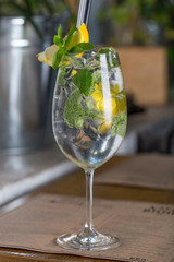 Fresh fruit coctail on the table of restaurant cafe transparent with puffs