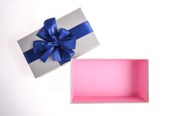 Open gift box with Blue bow isolated on white Background