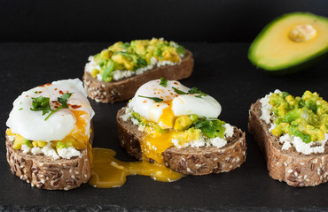 Variation of healthy rye breakfast sandwiches with avocado.