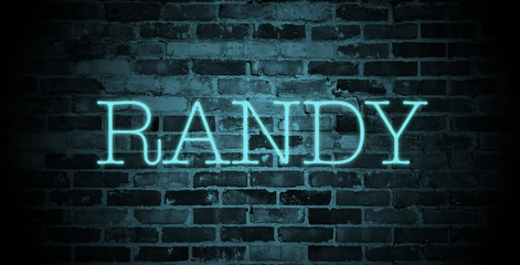 first name Randy in blue neon on brick wall