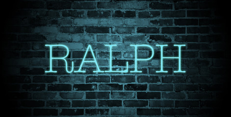 first name Ralph in blue neon on brick wall