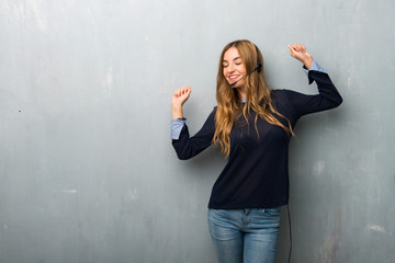 Telemarketer woman enjoy dancing while listening to music at a party