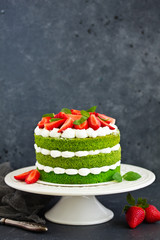 Cake with spinach, cream and strawberries. Valentine's Day.