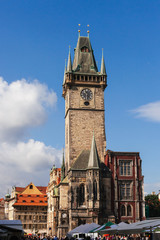 Fototapeta na wymiar View of the clock tower of the old town hall in Prague. The Prague Astronomical Clock or Prague Orloj is located here. This is a medieval clock first established in 1410. CZECH REPUBLIC 2012