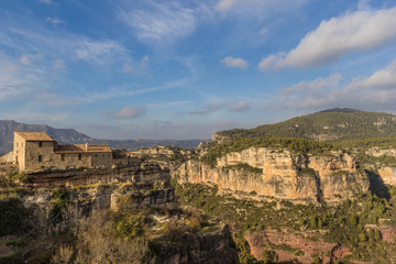 Picturesque house high in the mountain in a beautiful wild landscape in europe