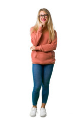 A full-length shot of a Young girl with glasses and smiling on isolated white background