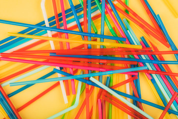 Drinking straws for colored background. Colorful plastic straws used for drinking water or soft drinks.