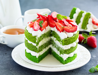 Cake with spinach, cream and strawberries. Valentine's Day.