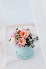 Beautiful spring bouquet with tender flowers in box