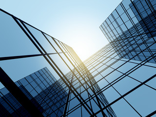 View of high rise glass building and dark steel window system on blue clear sky background,Business...