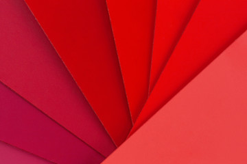 Hues of red in fan shape abstract background