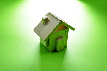 wooden house on green background