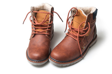 closeup of winter boots for men on white background