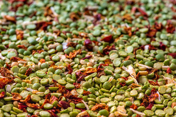 Ingredients for vegetarian soup with peas, spices and tomatoes. Indian food. Texture.