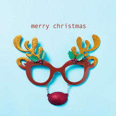 reindeer eyeglasses and text merry christmas