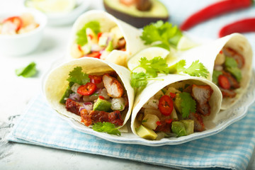 Homemade chicken taco with avocado
