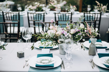 Wedding table setting and decoration. Flowers.
