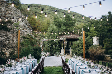 Wedding table setting and decoration. Flowers.