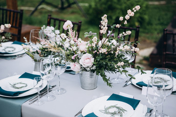 Wedding table setting and decoration. Flowers.
