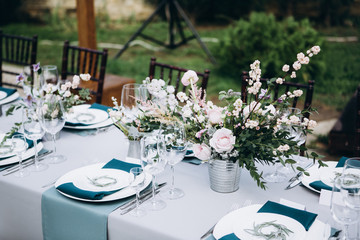 Wedding table setting and decoration. Flowers.