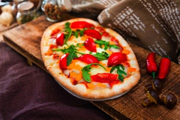 pizza with mozzarella, emmental and cheddar cheese