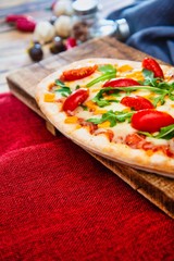 pizza with mozzarella, emmental and cheddar cheese