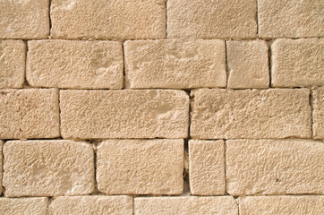 Old relief limestone wall closeup