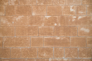 Old wall of relief limestone closeup