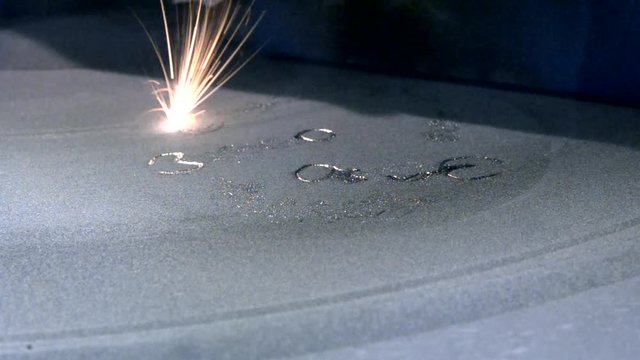 3D printer working close up. Automatic three dimensional 3d printer for metal. Modern 3D printer printing an object from the metal powder. Concept progressive additive technology for 3d printing.