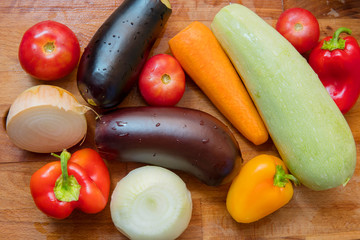 Fresh vegetables - tomatoes, eggplants, onions, sweet Bulgarian pepper.