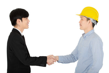 Young engineer in yellow protect helmet shaking hand with asian handsome business man in black suit to accepted agreement for new project. Portrait of business concept on isolated white background.