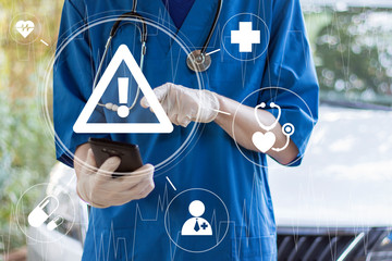 Doctor pushing button attention medicine network on virtual panel healthcare. Against the background of an ambulance.